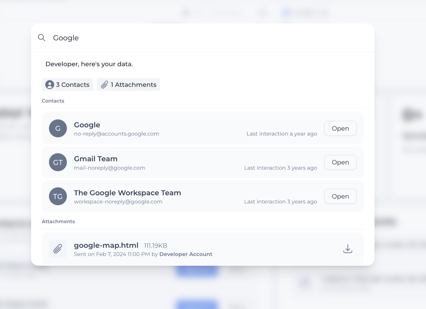 Global search results grouped into contacts and attachments